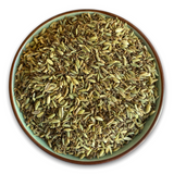 Teeschale mit dem Rohprodukt Kräutertee Anis Kümmel Fenchel