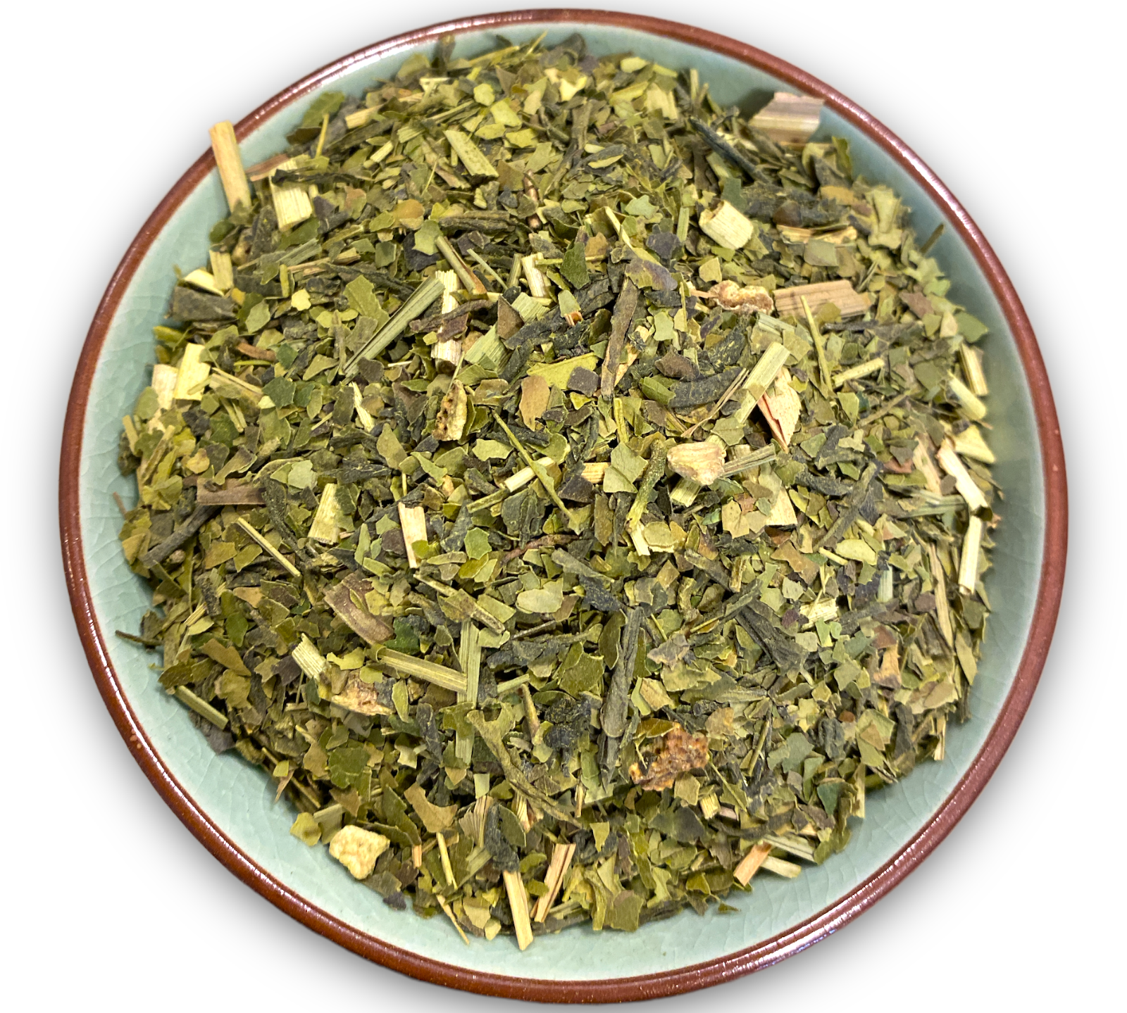Teeschale gefüllt mit Guayusablättern, Zitronengras und Matcha